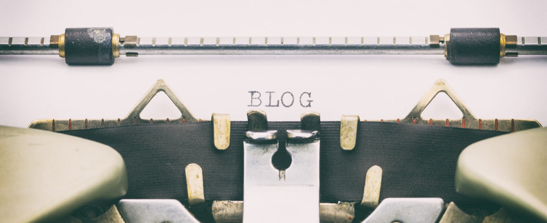 close-up of a typewriter with the word blog written on the otherwise blank page